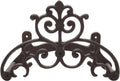 Dark metal wall-mounted garden hose hanger with ornate scroll centerpiece and side hooks.