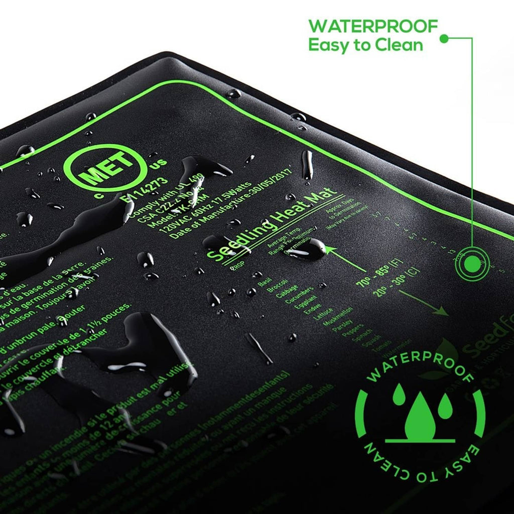 Waterproof seedling heat mat with water droplets on the black surface