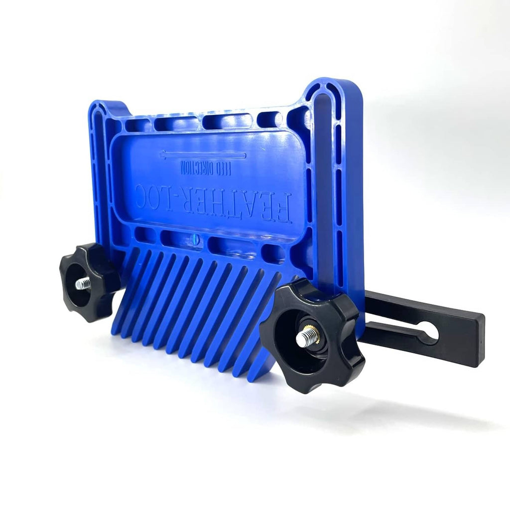 Blue featherboard safety clamp with comb teeth and two black lock knobs