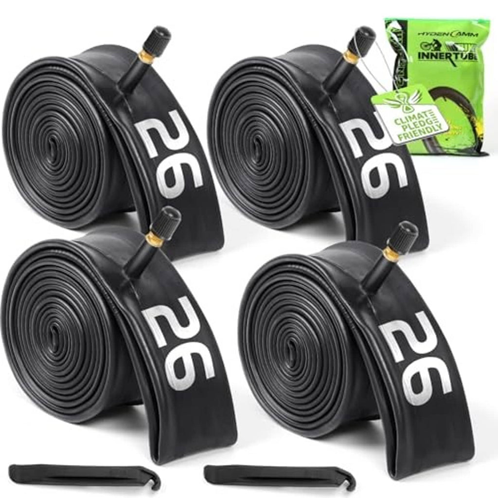 Black bicycle inner tubes four-pack with valves and a green inner tube pouch.