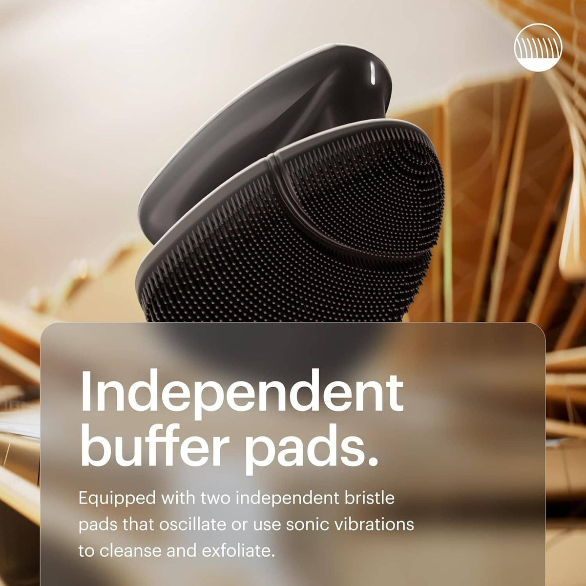 Electric silicone face scrubber head close-up with dual bristle pad texture