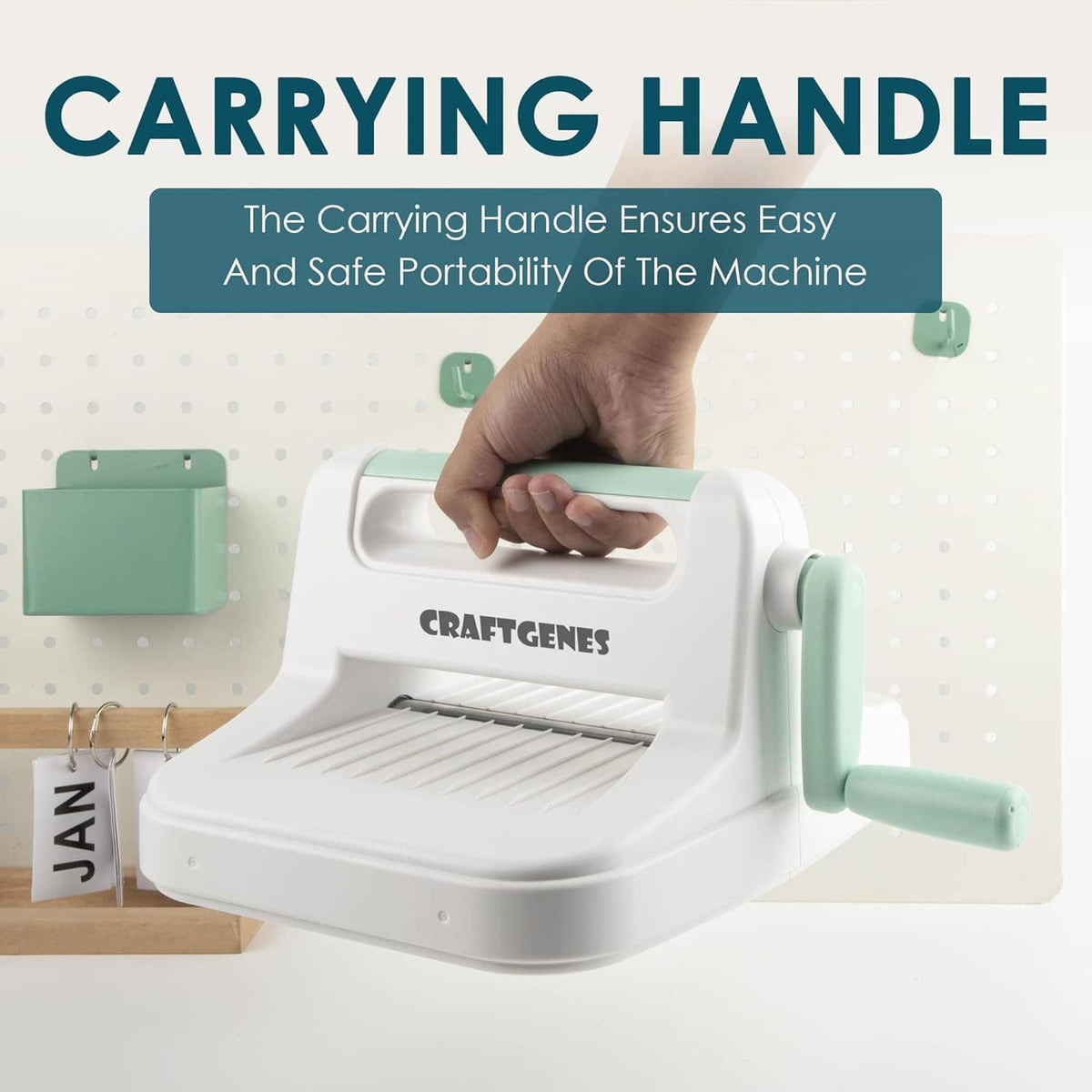 Manual die cutting and embossing machine with carrying handle, white and mint