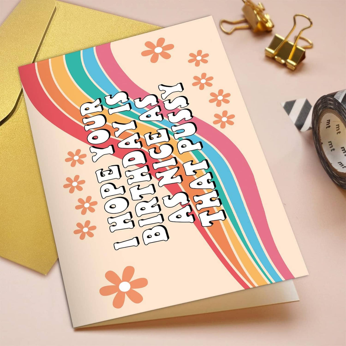 Funny birthday card with rainbow; message reads “I hope your birthday is as nice as that pussy”