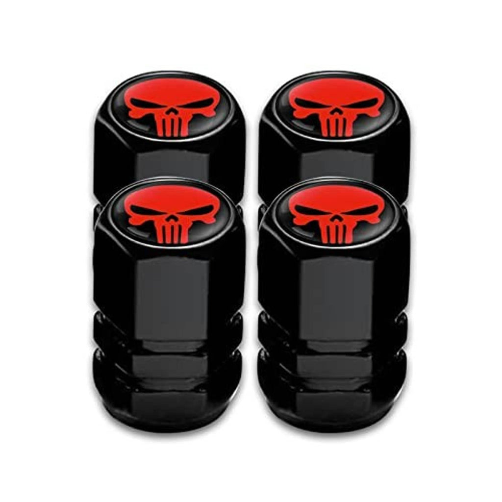 Four black tire valve stem caps with red skull emblem, grouped two-by-two
