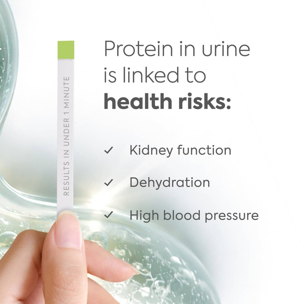 Urine protein test strip dipping into a urine sample cup