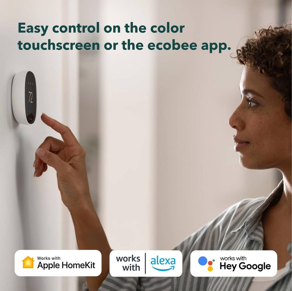 White smart thermostat with touch screen being used on a wall