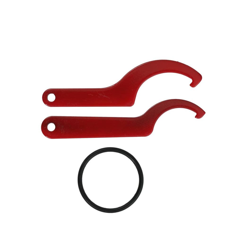 Red installation tools and a black rubber O-ring for coilover strut setup