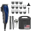 Blue and grey corded hair clipper with multiple guards, combs, scissors, and case