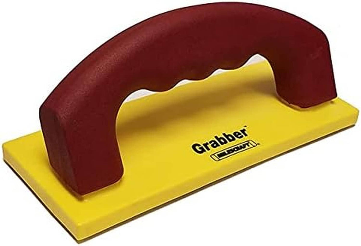 Grabber push stick with dark red handle and yellow base for woodworking safety