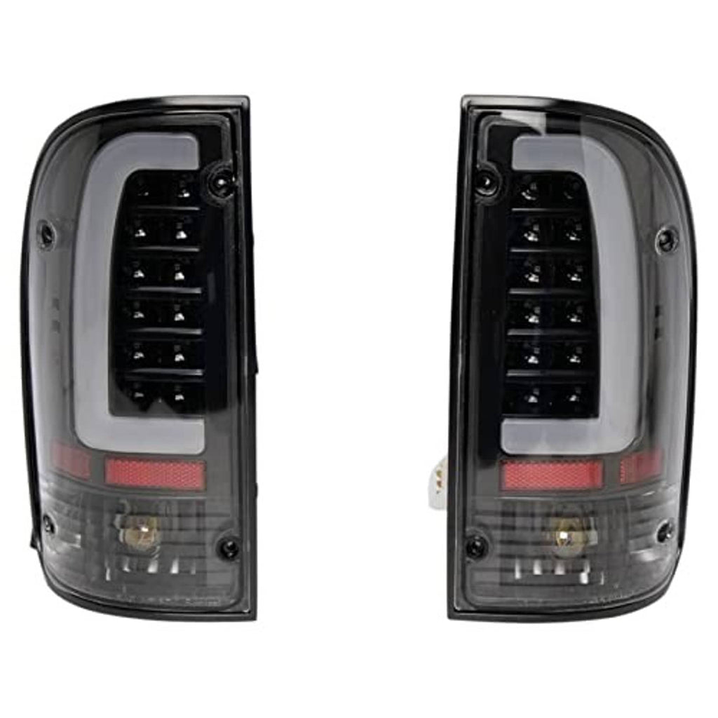 Pair of LED tail lights, black housing and clear lens, red reflector strip at bottom