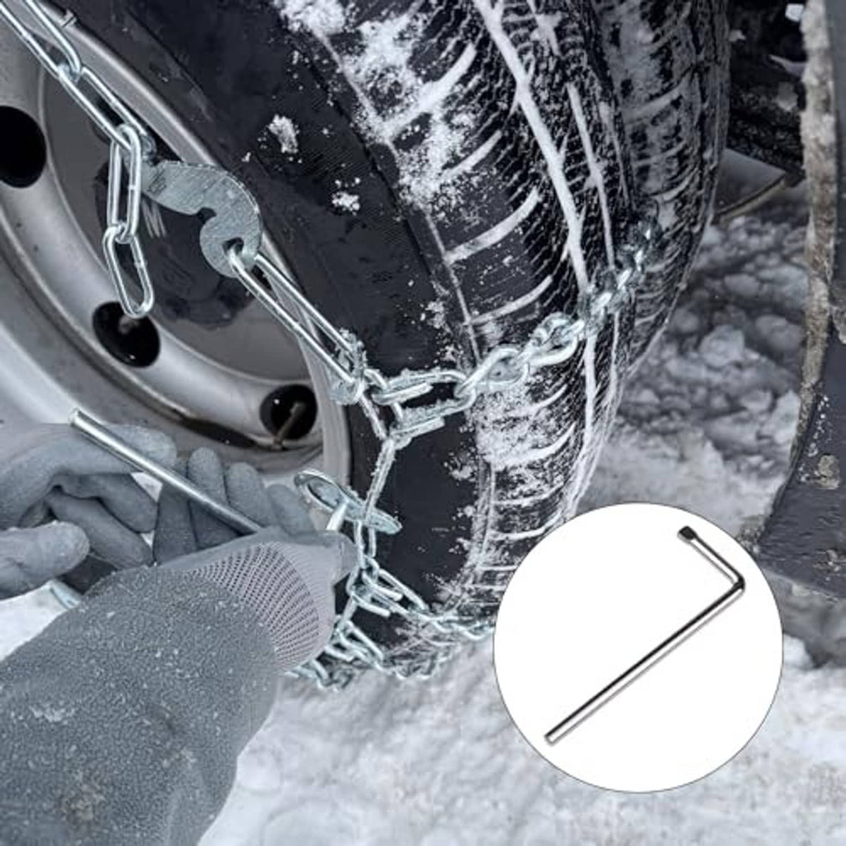 Gloved hand using chrome L-handle tire chain tool on chained truck tire