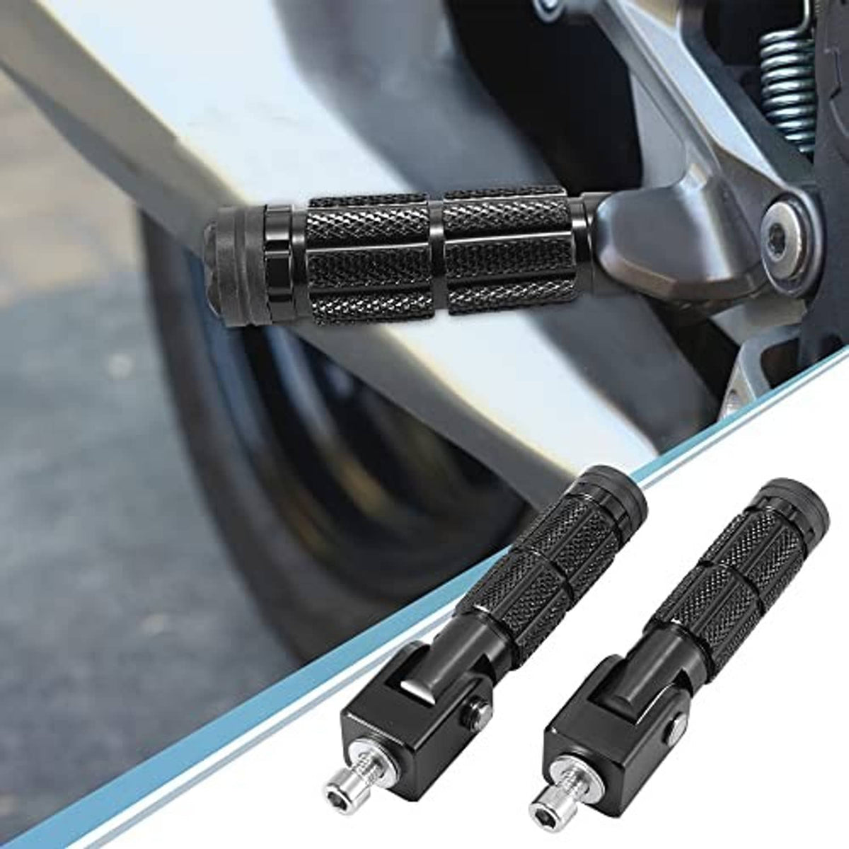 Black folding motorcycle rearset pegs installed near rear wheel area