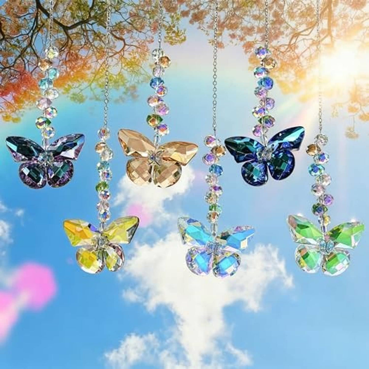 Crystal butterfly suncatchers with multicolored butterfly charms hanging outdoors in sunlight