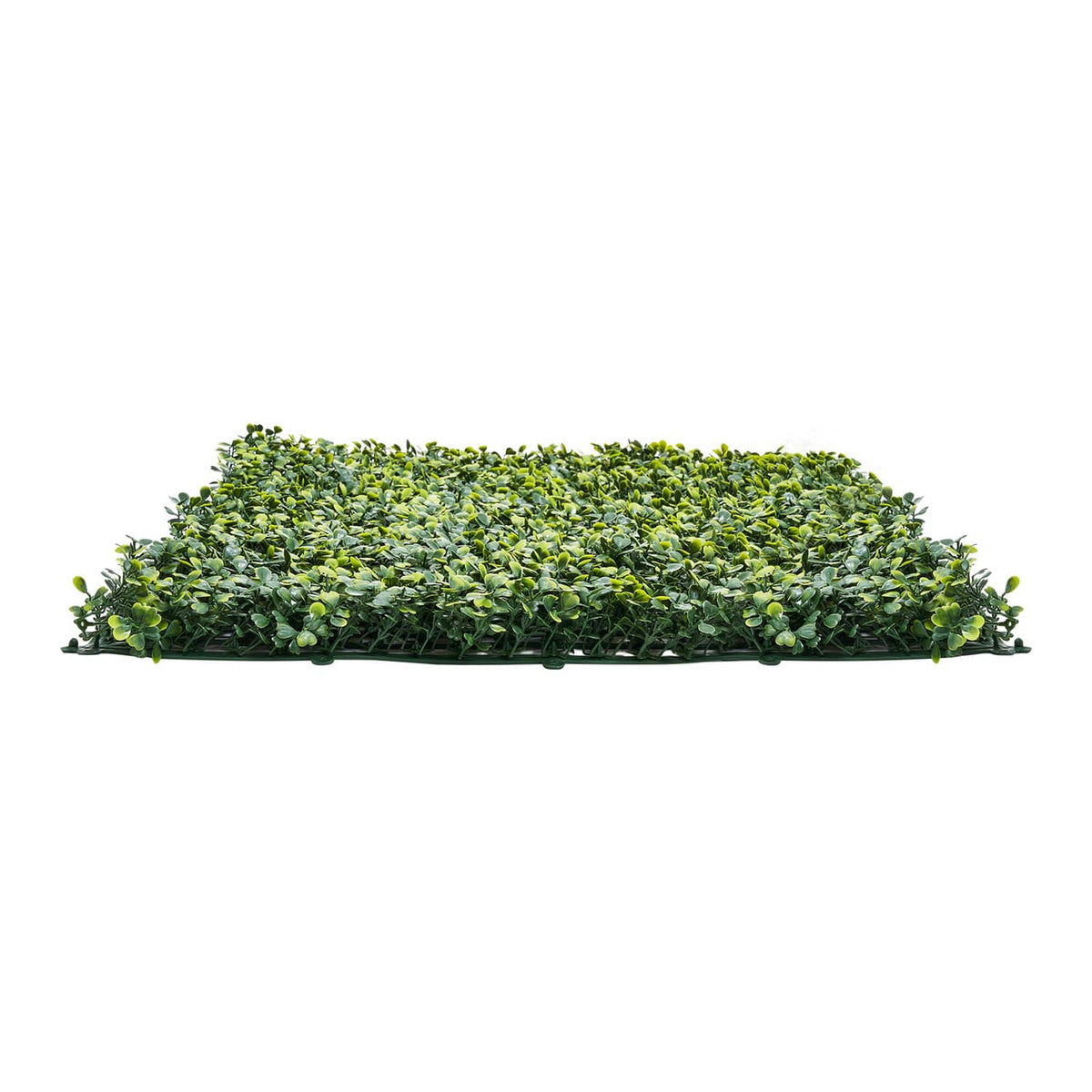 Green artificial grass panel folded flat with dense leaf-like blades