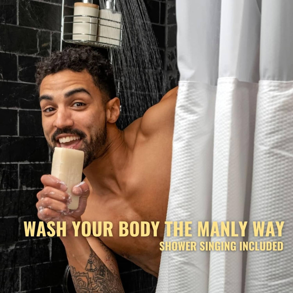 Man holding beige soap bar in shower with water running