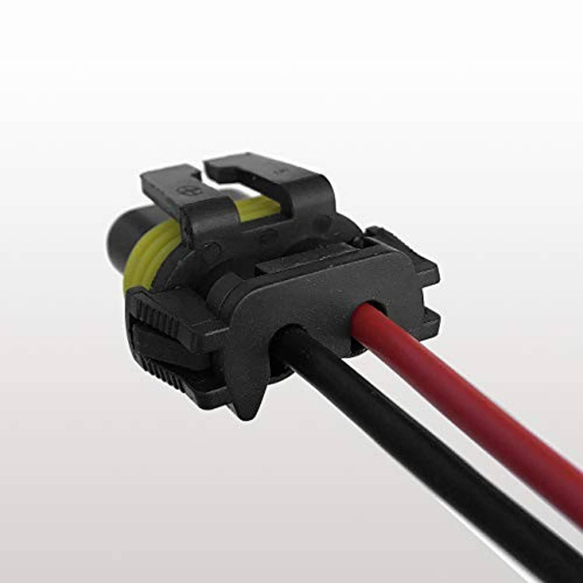 Female headlight pigtail connector with black housing and red wire lead
