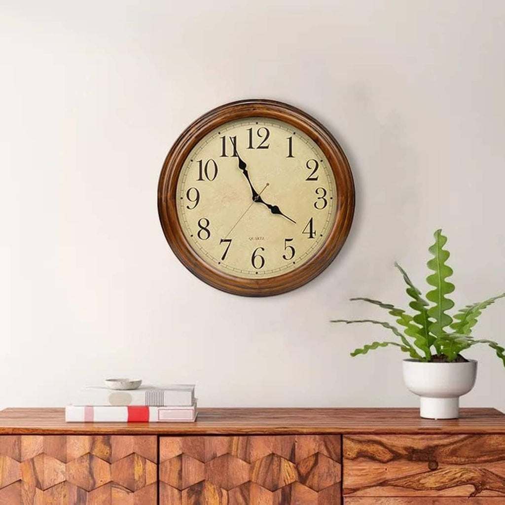 Round wood wall clock with cream face, large Arabic numerals and black clock hands