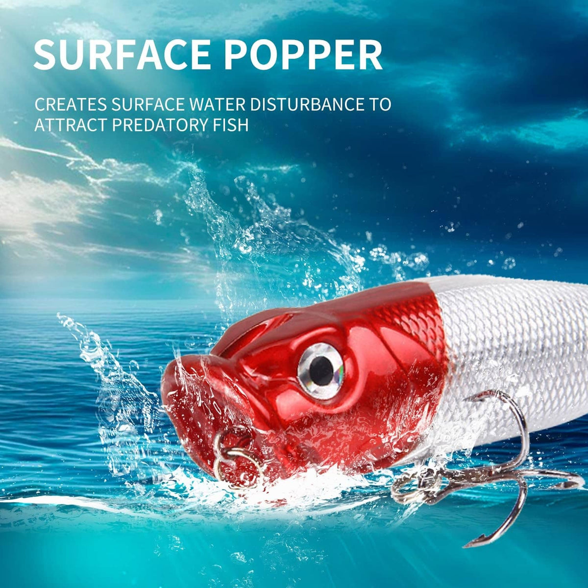 Red and white surface popper fishing lure with large front eye and treble hooks
