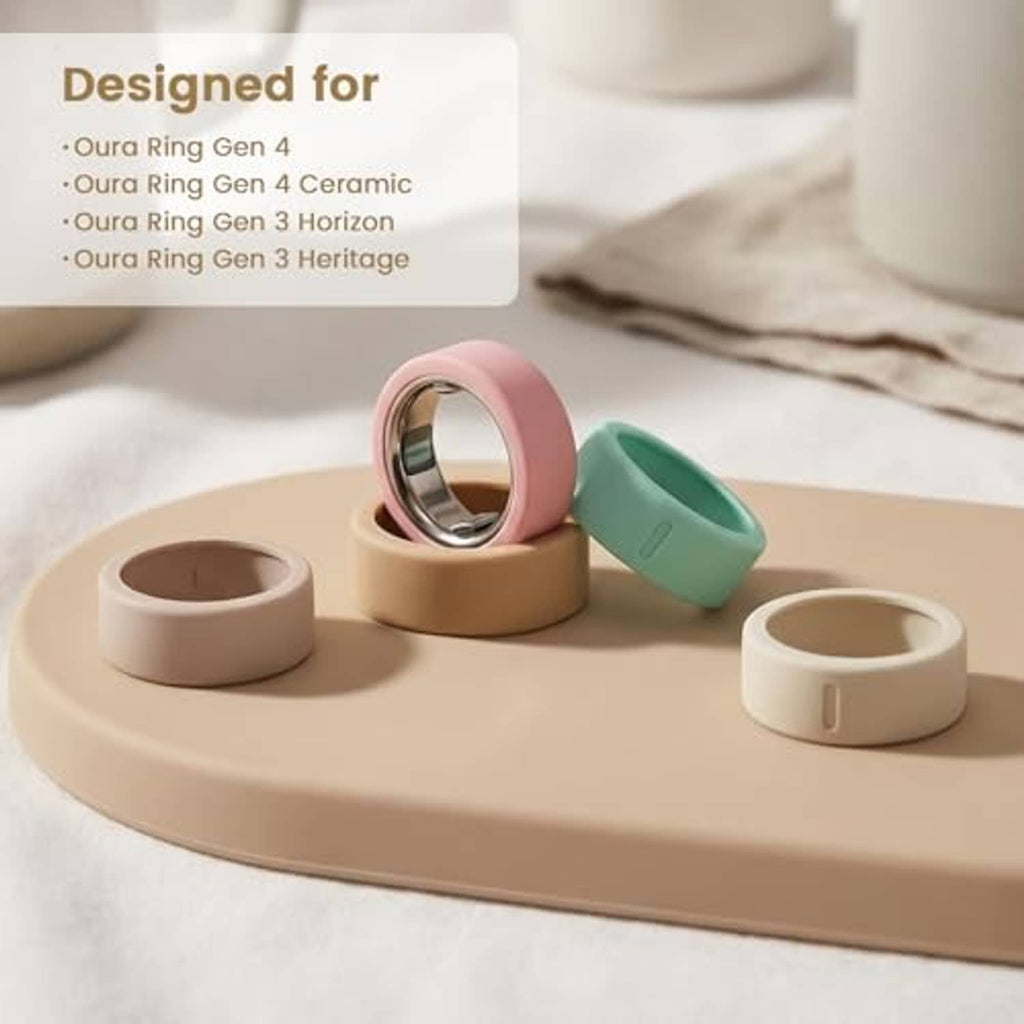 Assorted ring covers display: pink, taupe, green, and white on a tray