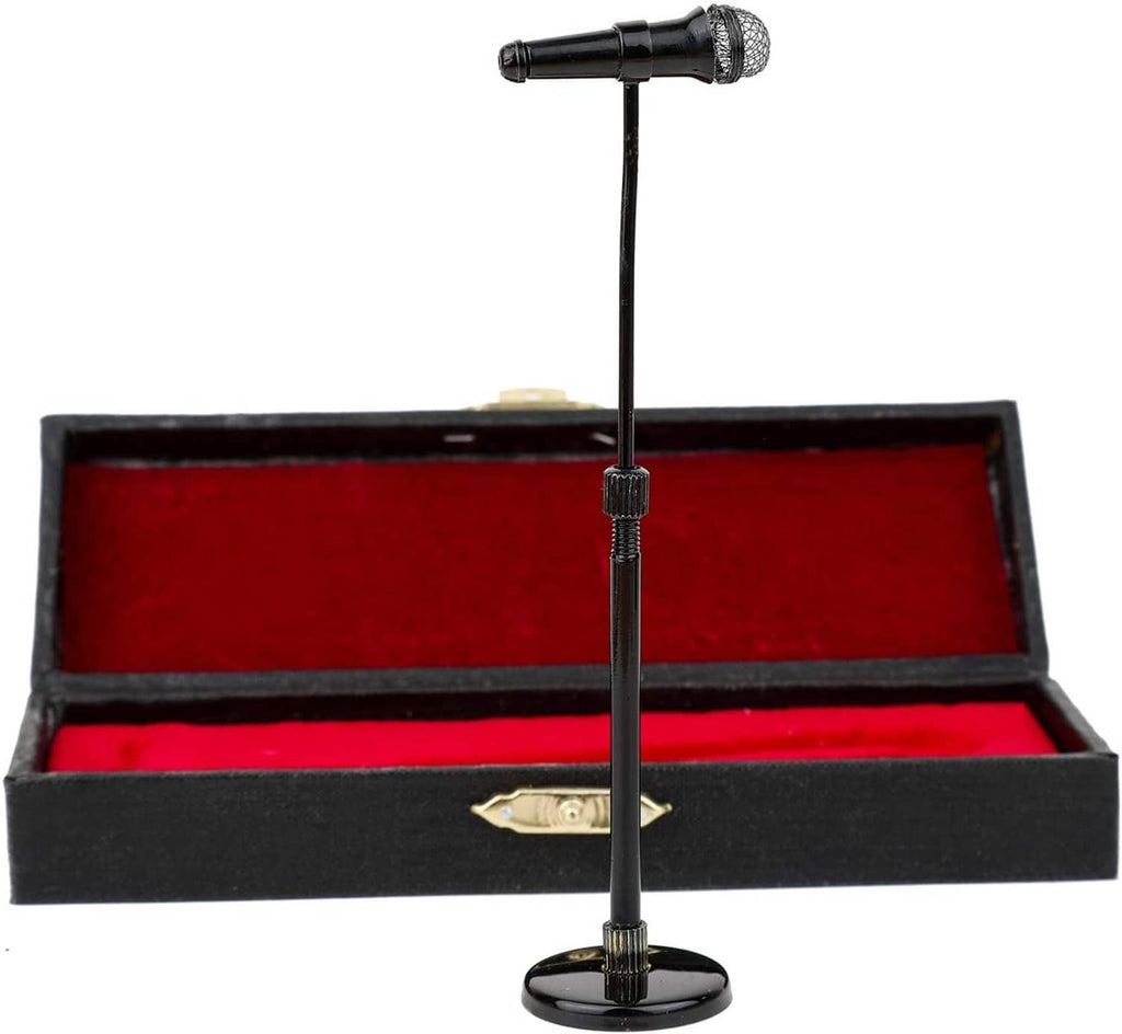 Miniature microphone on stand with black case and red velvet lining