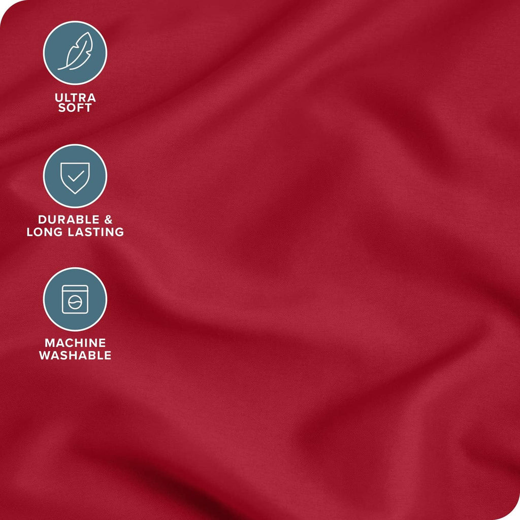 Red microfiber pillowcase fabric with smooth, wrinkle-resistant texture close-up
