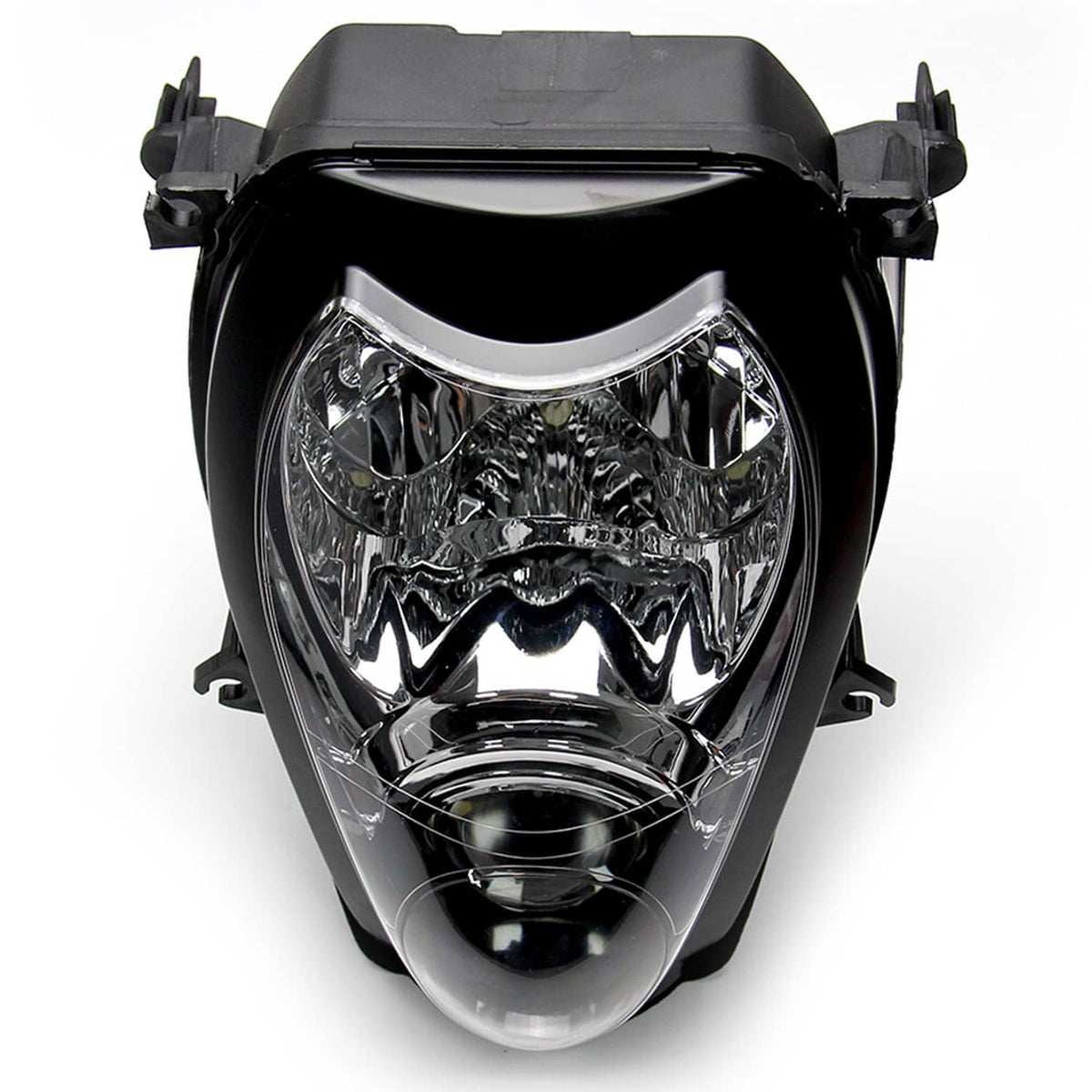 Front view of motorcycle headlight assembly with clear lens and chrome reflector elements