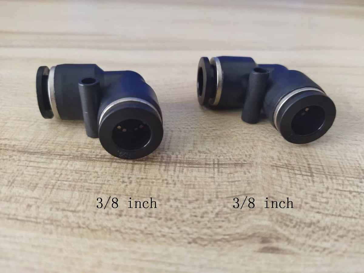Black plastic 3/8 inch push elbow unions, two fittings, barbed ends