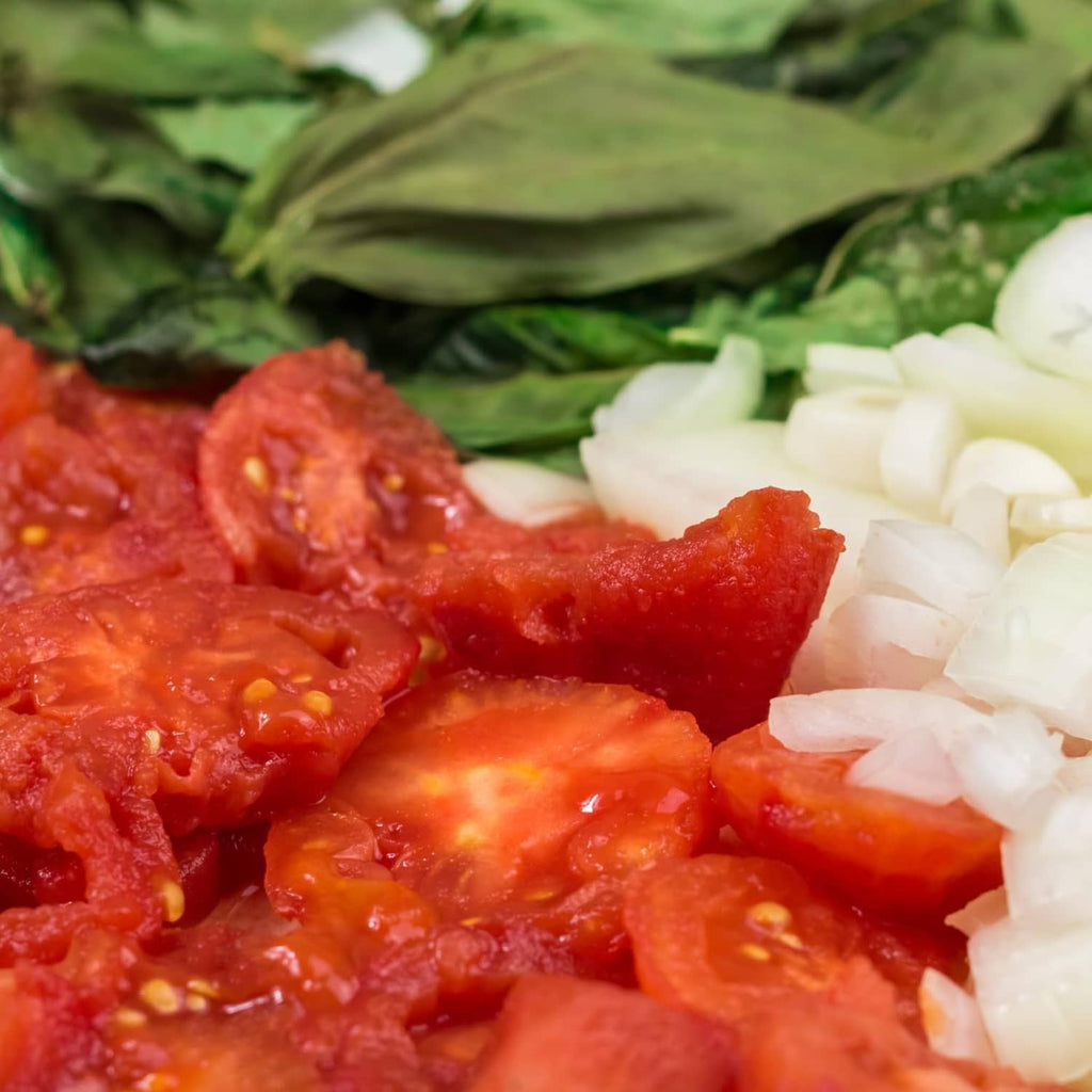 Chopped tomatoes with diced onions and tomato pieces