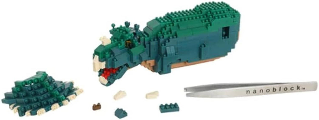 Triceratops dinosaur block model with scattered pieces and a nanoblock tool