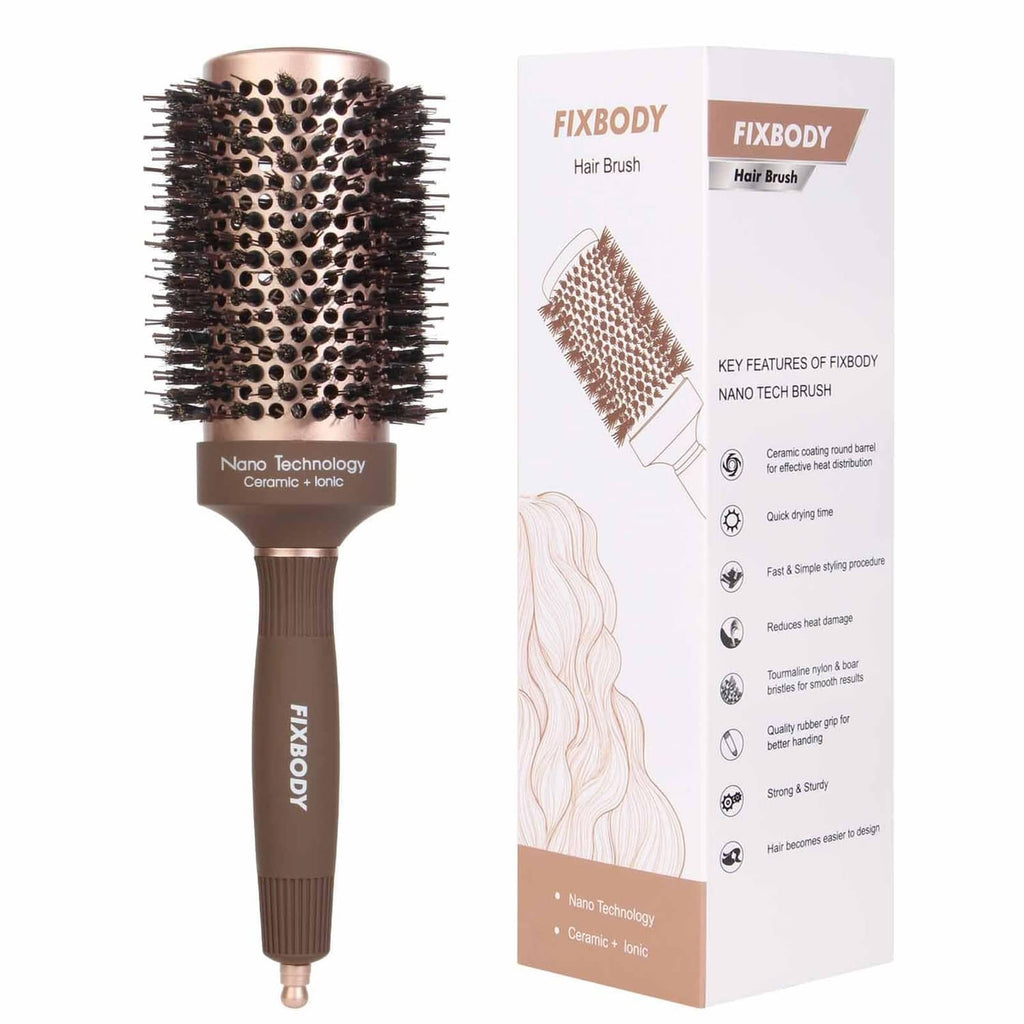 Round hair brush with dark bristles and brown handle, shown with product packaging