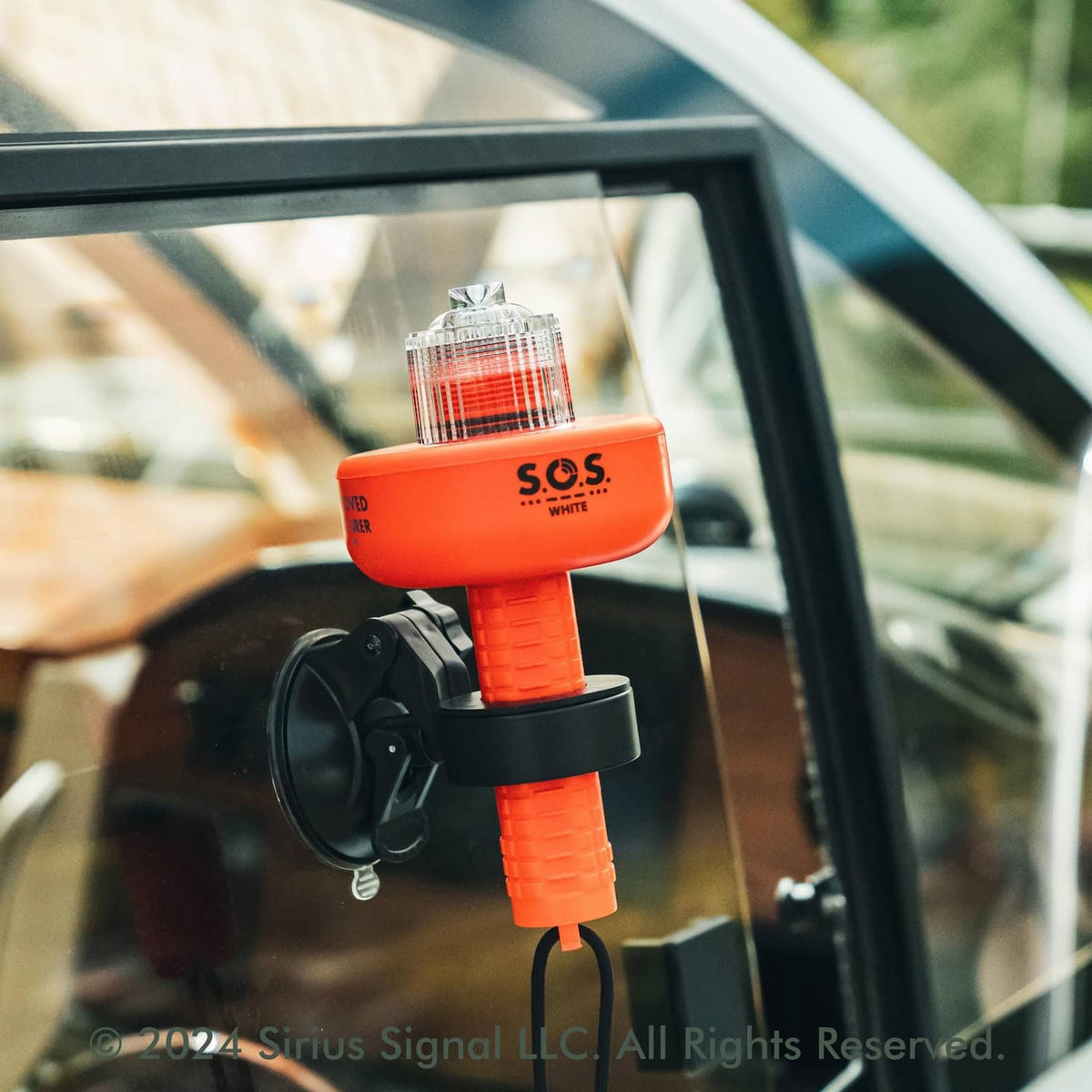 Red SOS LED distress flare mounted in an automotive-style holder with clear beacon