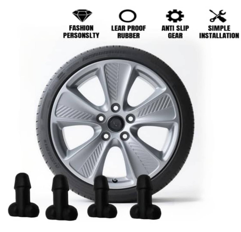 Four black valve stem caps placed around a silver wheel rim