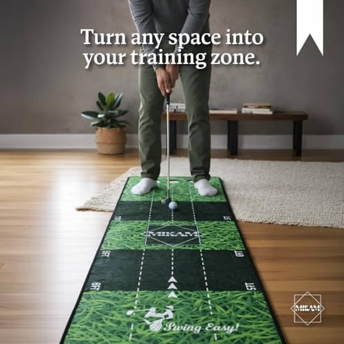 Indoor golf putting mat on floor with green grass texture, black target lanes and white distance markings