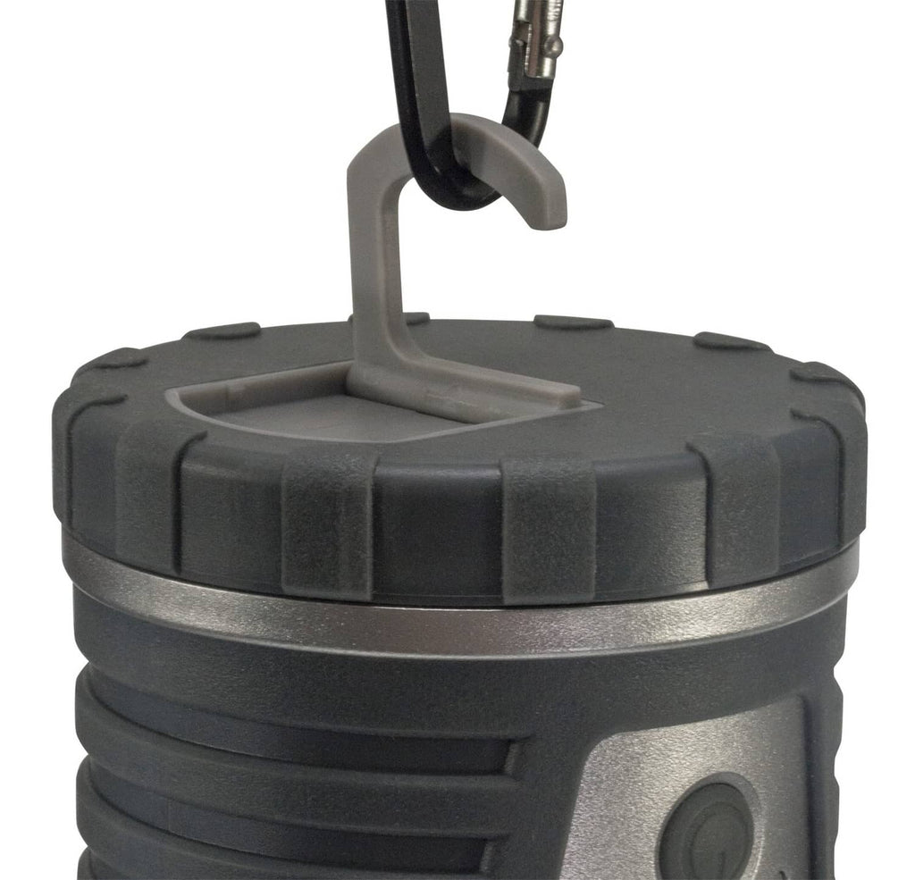 Gray lantern with hinged carry handle and circular light control on the base