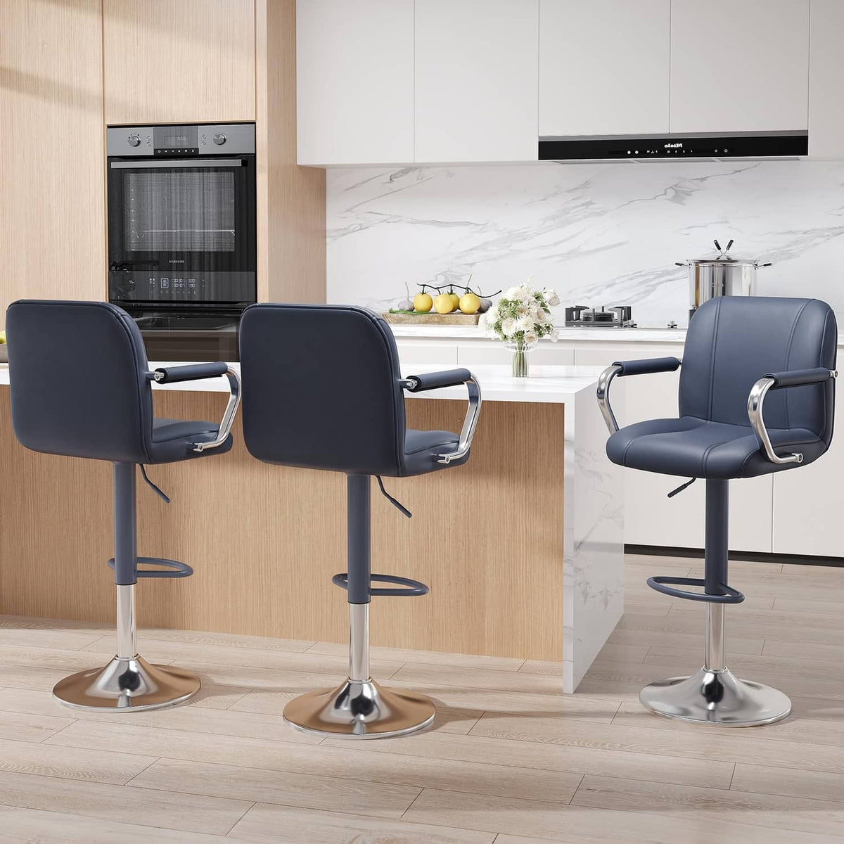Blue counter-height stool set with backs, padded armrests, chrome pedestal base