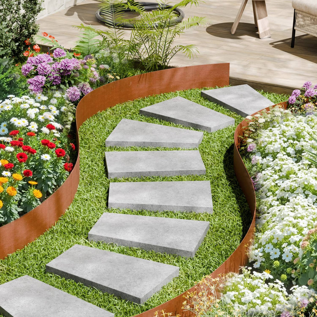 Rust-brown steel landscape edging border with pointed spikes around stepped garden path
