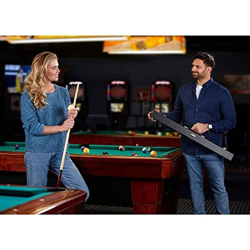 Black billiard cue hard case carried by a player at a pool table