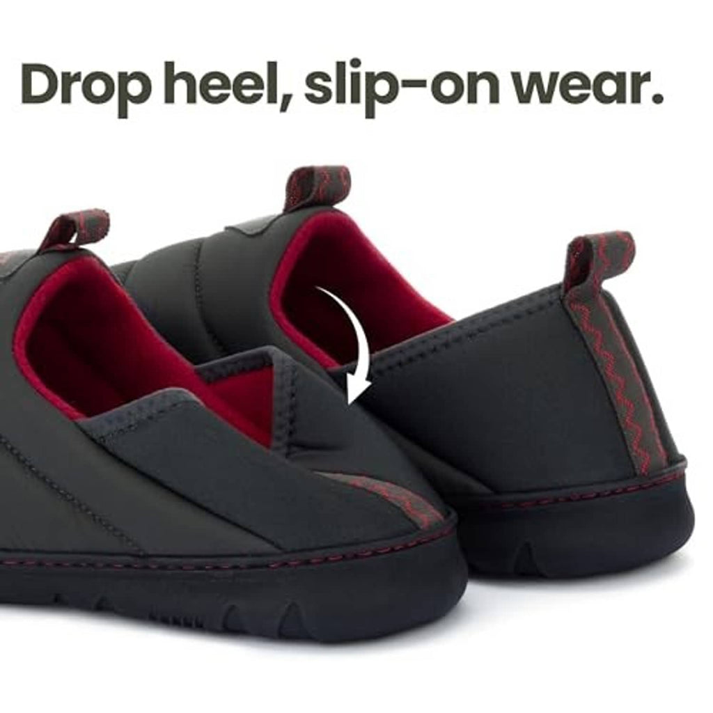 Men's dark grey slip-on loafer slipper with red-lined collar detail and stitching.