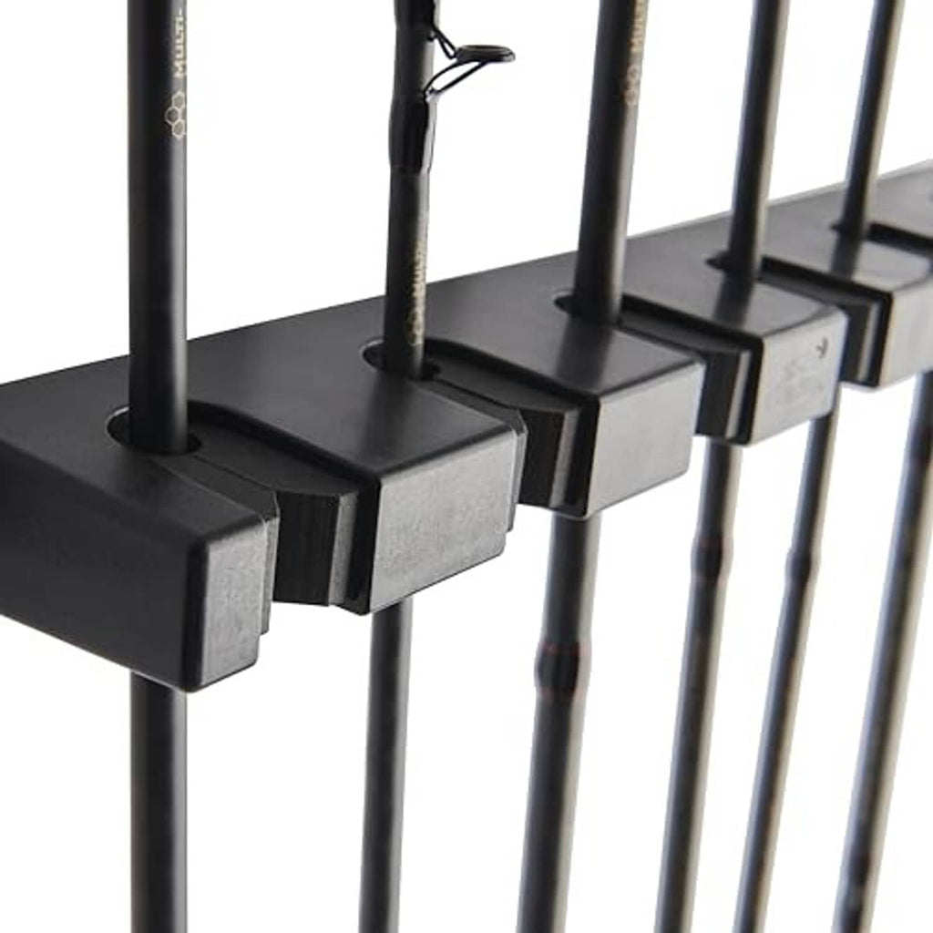 Black foam rod-grip pads on horizontal rod rack, close-up