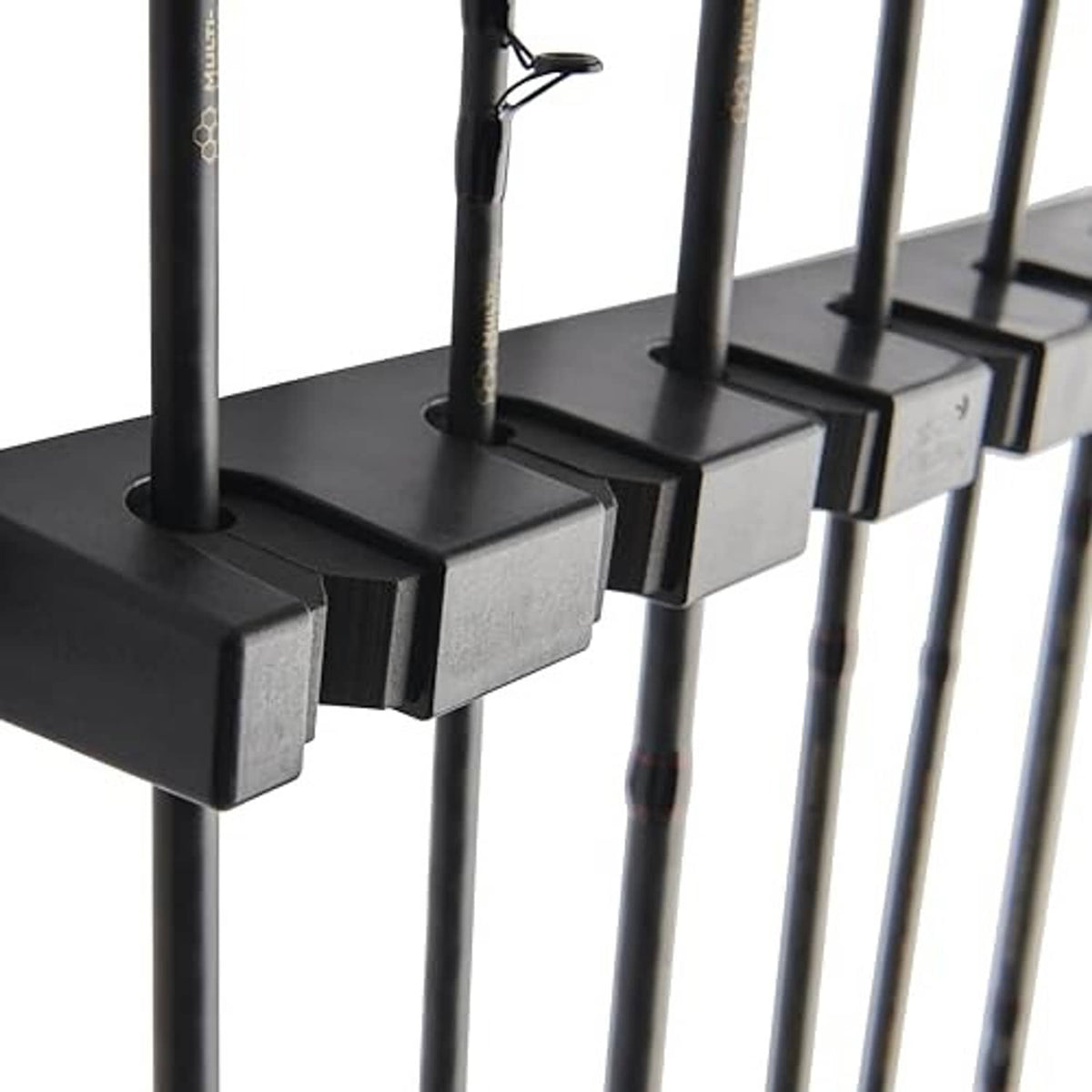 Black foam rod-grip pads on horizontal rod rack, close-up