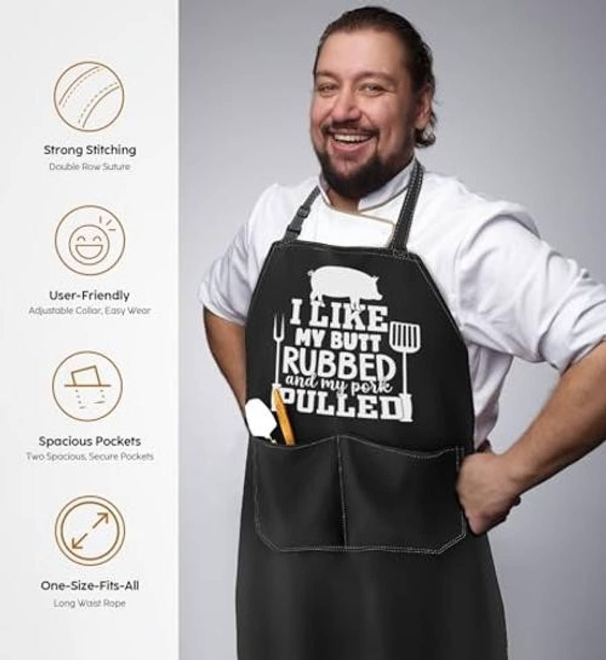 Black apron with large front pocket, novelty white print, worn over chef attire