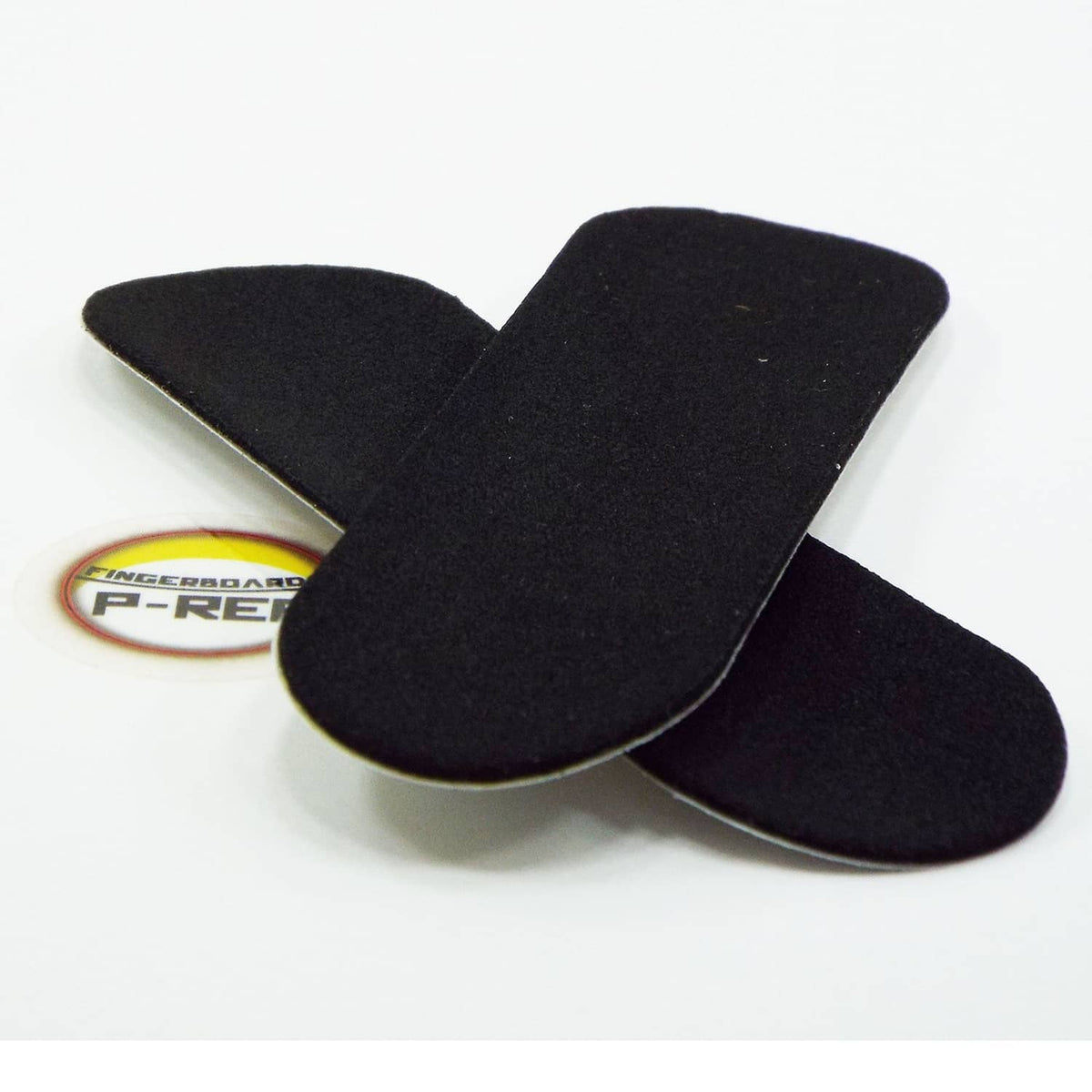 Black fingerboard decks with round logo on one deck
