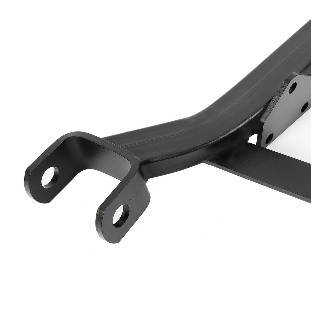 Close-up of black steel axle lift bracket end with circular mounting holes
