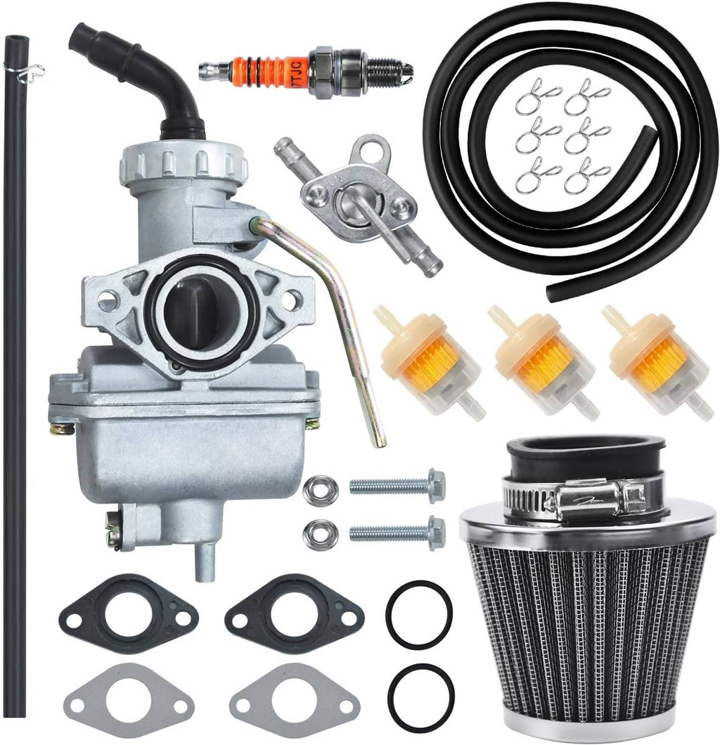 Carburetor kit with air filter, black fuel line hoses, fittings, gaskets, and spark plug
