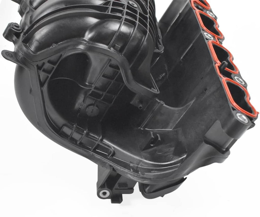 Close-up of black intake manifold housing and orange gasket edge