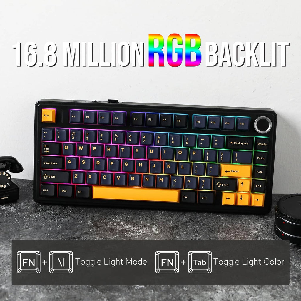 Black mechanical keyboard with RGB backlight, orange keycaps, and front-facing keys