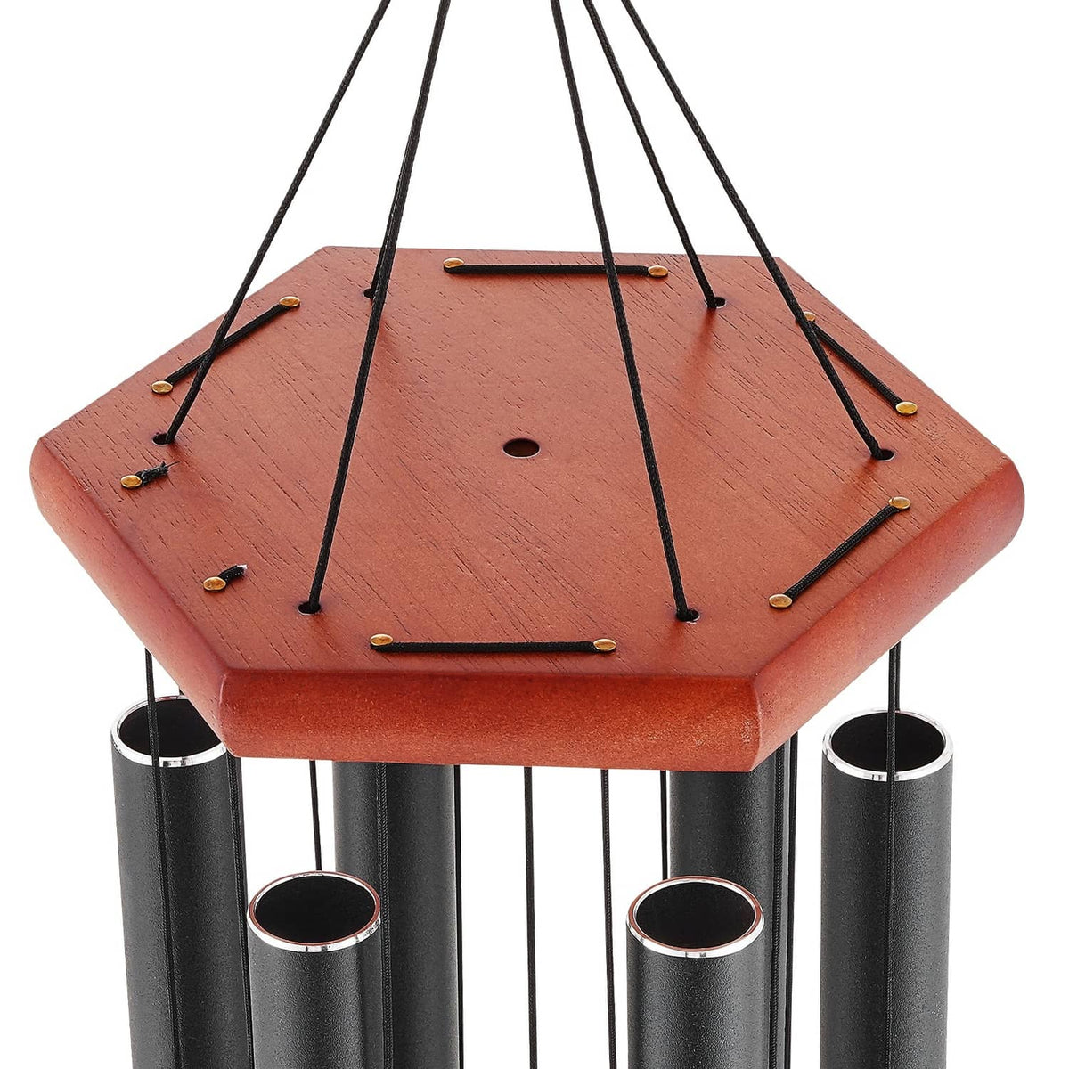 Outdoor wind chime close-up: reddish top plate, black cords, and black tubes