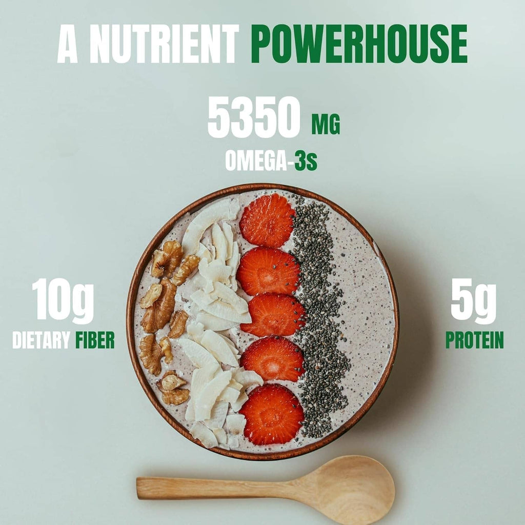 Chia seeds bowl with sliced strawberries and oats, dark speckled seed surface