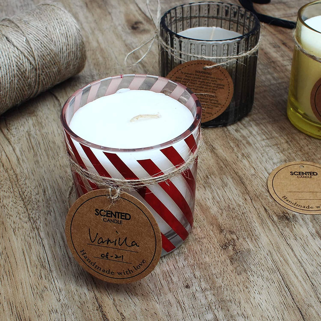 Candle wick kit items with cotton wick candle and round wick accessories on wooden surface