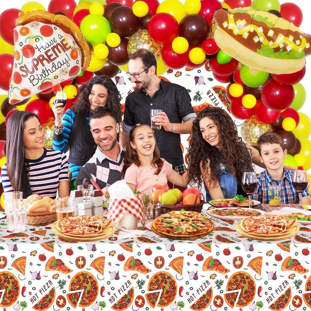 White tablecloth with repeating Hot Pizza slice and vegetable graphics